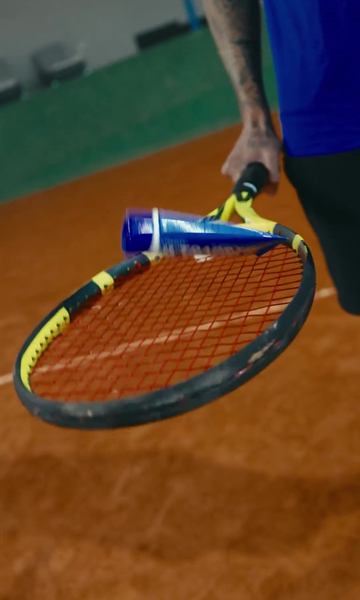 Tennis racket with UltraGrip Overgrip